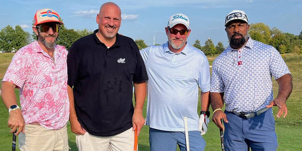 JO and Silvian golfing team